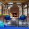 Large covered outdoor patio with a fire place 